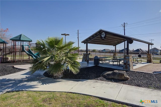 community jungle gym with fence and a gazebo