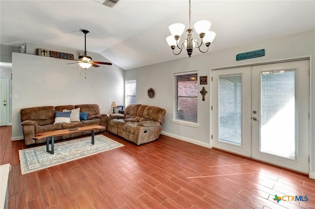 104 Majestic Ln, Victoria, TX 77904 - living room with lofted ceiling, french doors, wood finished floors, ceiling fan, and a chandelier