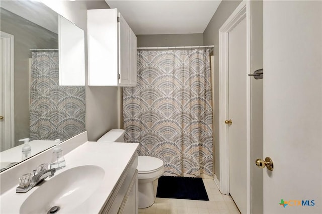 104 Majestic Ln, Victoria, TX 77904 - full bath featuring vanity, a shower with shower curtain, and tile patterned flooring