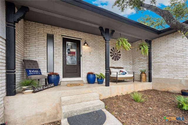 30817 Wildcat Dr, Bulverde, TX 78163 - property entrance with covered porch and brick siding