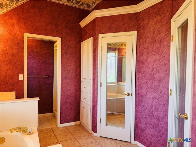 3900 Chisholm Trl, Salado, TX 76571 - bathroom with tile patterned flooring, a garden tub, and baseboards