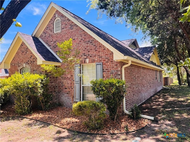3900 Chisholm Trl, Salado, TX 76571 - view of property exterior featuring brick siding and roof with shingles