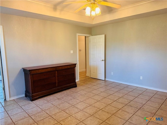 3900 Chisholm Trl, Salado, TX 76571 - unfurnished room featuring ceiling fan, crown molding, light tile patterned floors, baseboards, and a tray ceiling