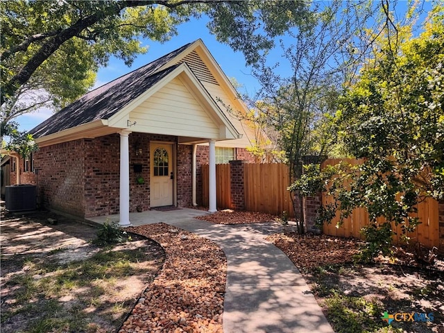 3900 Chisholm Trl, Salado, TX 76571 - ranch-style house featuring brick siding, fence, central air condition unit, and roof with shingles