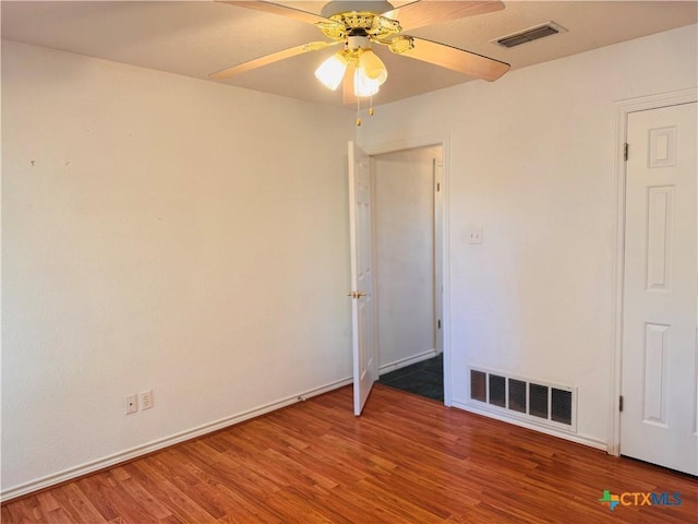 3900 Chisholm Trl, Salado, TX 76571 - empty room featuring a ceiling fan, wood finished floors, and baseboards