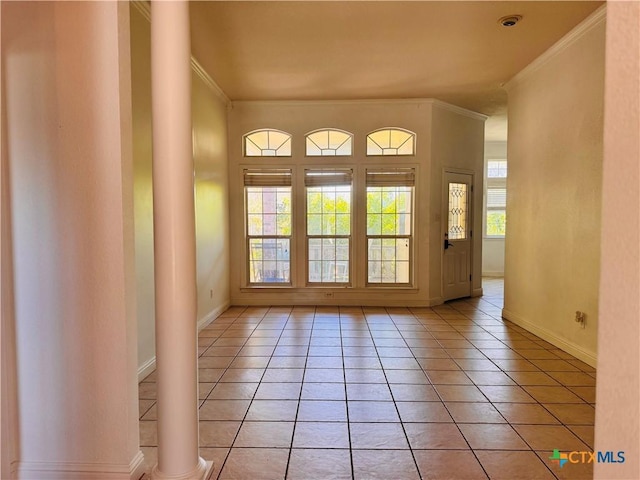 3900 Chisholm Trl, Salado, TX 76571 - doorway with ornamental molding, baseboards, light tile patterned floors, and decorative columns