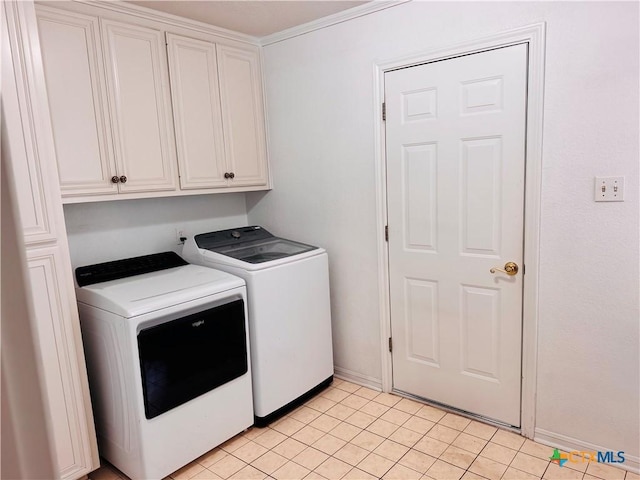 3900 Chisholm Trl, Salado, TX 76571 - washroom with washing machine and dryer, cabinet space, light tile patterned flooring, and baseboards
