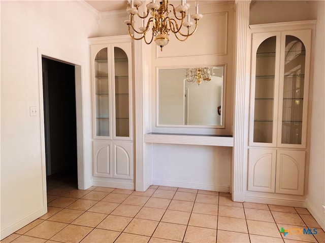 3900 Chisholm Trl, Salado, TX 76571 - unfurnished dining area with a chandelier, light tile patterned floors, baseboards, and crown molding