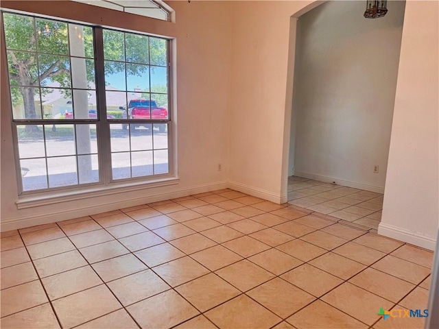 3900 Chisholm Trl, Salado, TX 76571 - spare room featuring light tile patterned floors and baseboards