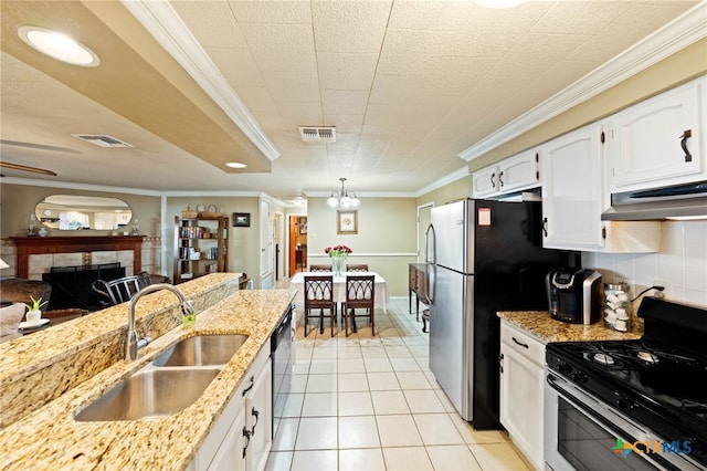 kitchen featuring white cabinetry, visible vents, appliances with stainless steel finishes, and a sink