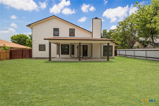 601 Pondview Dr, Killeen, TX 76542 - rear view of house with a patio area, a fenced backyard, and a chimney