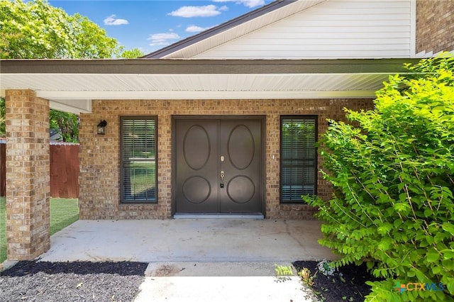 601 Pondview Dr, Killeen, TX 76542 - property entrance featuring covered porch and brick siding