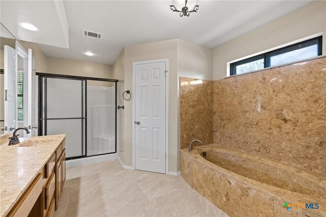 601 Pondview Dr, Killeen, TX 76542 - full bathroom with vanity, a shower stall, and a bath