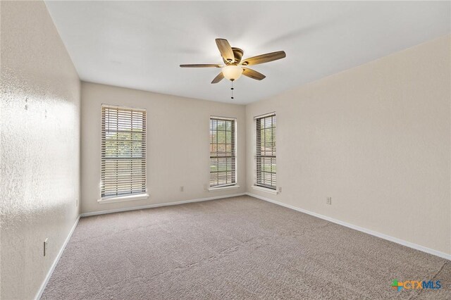 601 Pondview Dr, Killeen, TX 76542 - carpeted empty room featuring ceiling fan and baseboards