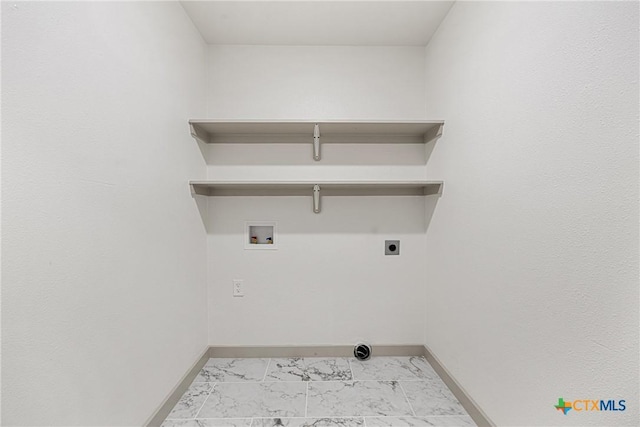 3268 Eagle Point W Ave, Belton, TX 76513 - clothes washing area with washer hookup, baseboards, electric dryer hookup, and light marble finish flooring