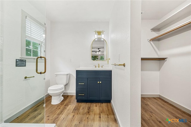 3268 Eagle Point W Ave, Belton, TX 76513 - full bathroom with wood finished floors, toilet, baseboards, and vanity