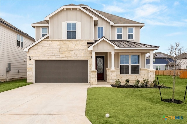 craftsman-style home with a front yard, a garage, and a porch