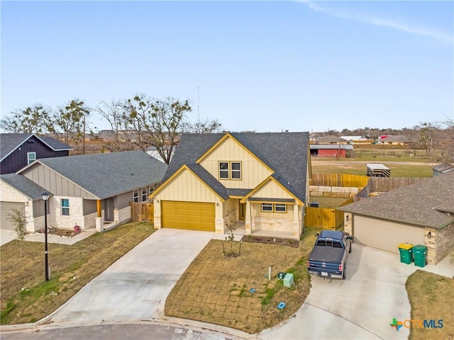 2143 Blackhawk Loop, Belton, TX 76513 - craftsman-style house featuring board and batten siding, concrete driveway, roof with shingles, and an attached garage