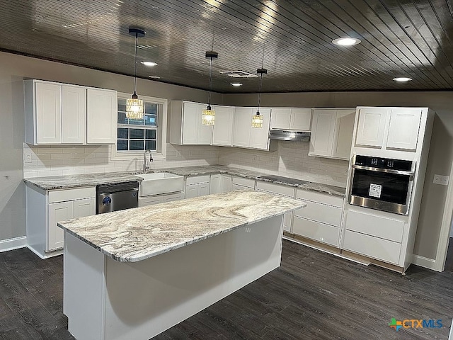 kitchen with white cabinetry, sink, dark hardwood / wood-style floors, backsplash, and appliances with stainless steel finishes