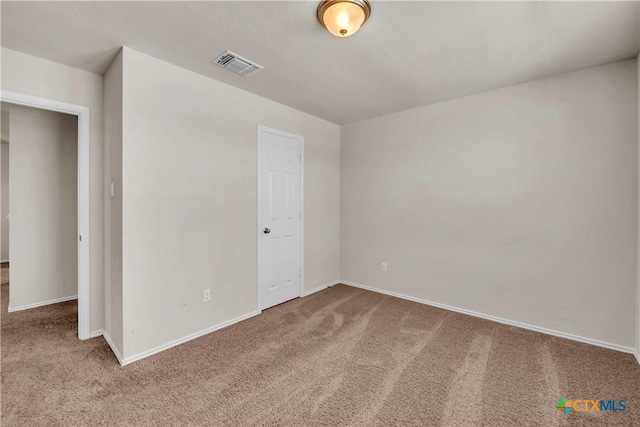 6106 Amelia Earhart Blvd, Killeen, TX 76543 - spare room featuring carpet and baseboards