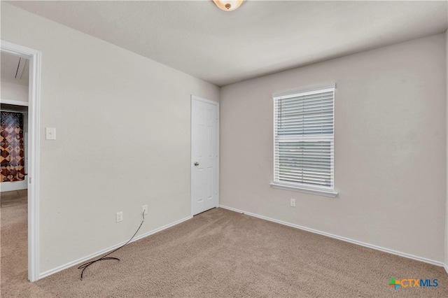 6106 Amelia Earhart Blvd, Killeen, TX 76543 - carpeted empty room featuring attic access and baseboards