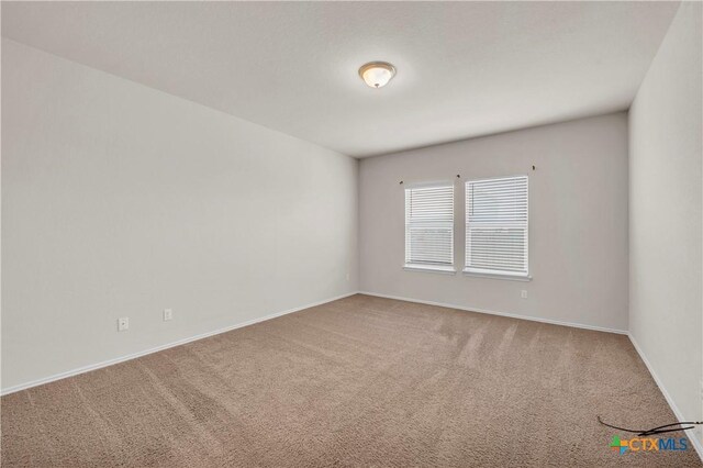 6106 Amelia Earhart Blvd, Killeen, TX 76543 - carpeted spare room featuring baseboards