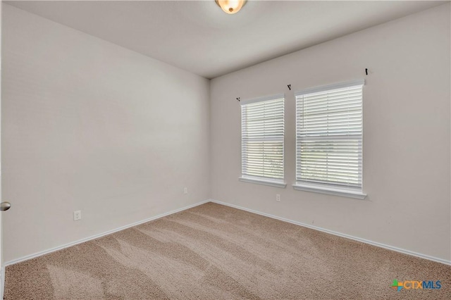 6106 Amelia Earhart Blvd, Killeen, TX 76543 - carpeted spare room featuring baseboards