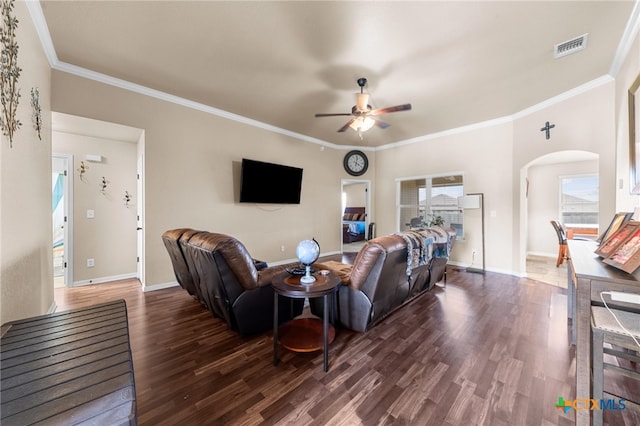 living room with ornamental molding, dark hardwood / wood-style floors, and ceiling fan