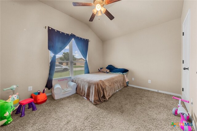 carpeted bedroom featuring vaulted ceiling and ceiling fan