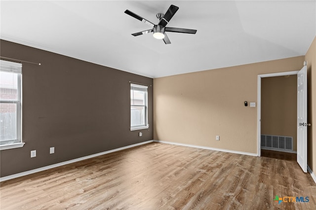 5300 Two Step Pl, Killeen, TX 76542 - empty room featuring wood finished floors, a ceiling fan, lofted ceiling, and baseboards
