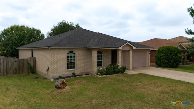 5300 Two Step Pl, Killeen, TX 76542 - ranch-style home featuring driveway, a garage, brick siding, and roof with shingles