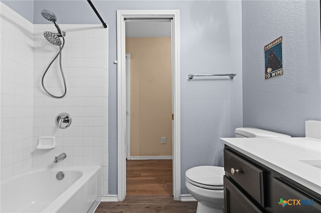 5300 Two Step Pl, Killeen, TX 76542 - bathroom featuring toilet, vanity, tub / shower combination, wood finished floors, and baseboards