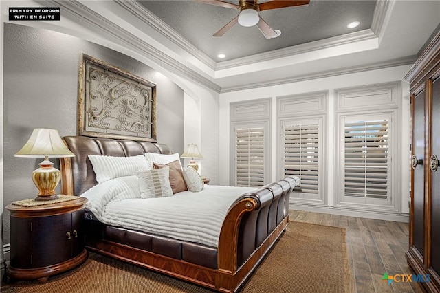 111 Western Oaks, New Braunfels, TX 78132 - bedroom with wood finished floors, recessed lighting, crown molding, and a raised ceiling