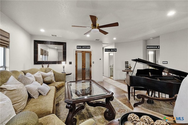 111 Western Oaks, New Braunfels, TX 78132 - living area with visible vents, ceiling fan, wood finished floors, recessed lighting, and french doors