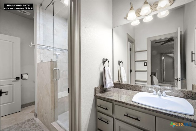 111 Western Oaks, New Braunfels, TX 78132 - full bath with tile patterned floors, vanity, and a shower stall