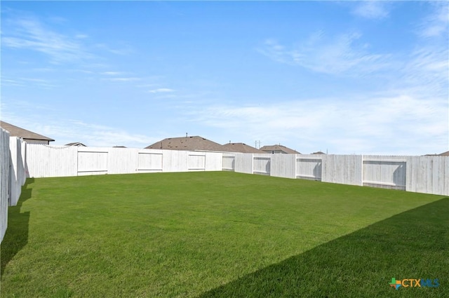 1211 N Teychas Dr, Kyle, TX 78640 - view of yard featuring a fenced backyard