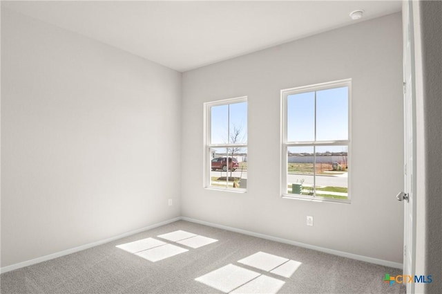 1211 N Teychas Dr, Kyle, TX 78640 - unfurnished room with carpet floors and baseboards