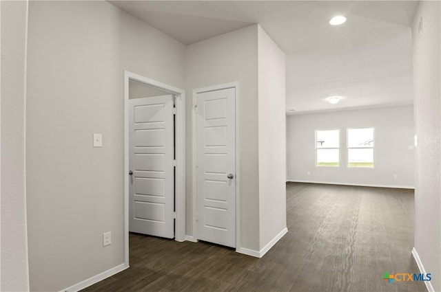 1211 N Teychas Dr, Kyle, TX 78640 - corridor featuring baseboards, recessed lighting, and dark wood-type flooring