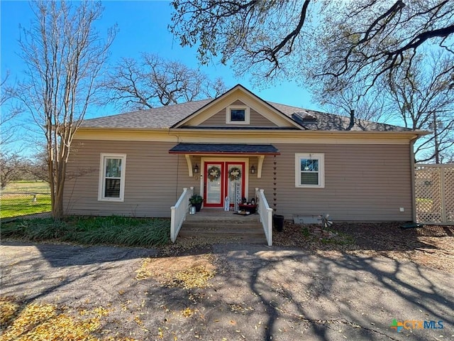 view of front of property with fence