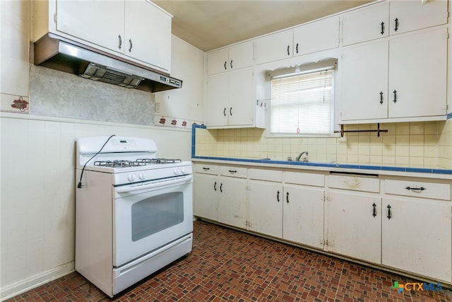 kitchen with white cabinetry, sink, and white gas range oven