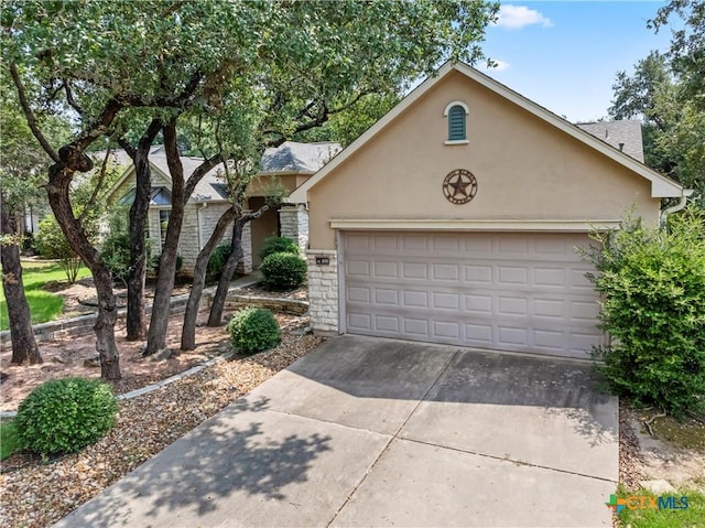 single story home with a garage