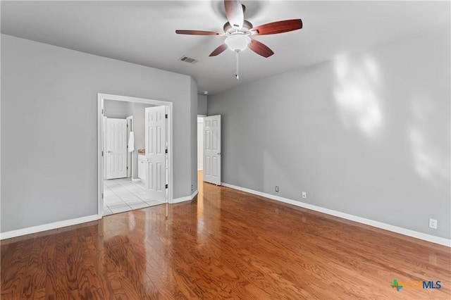 unfurnished bedroom featuring ceiling fan and light hardwood / wood-style flooring