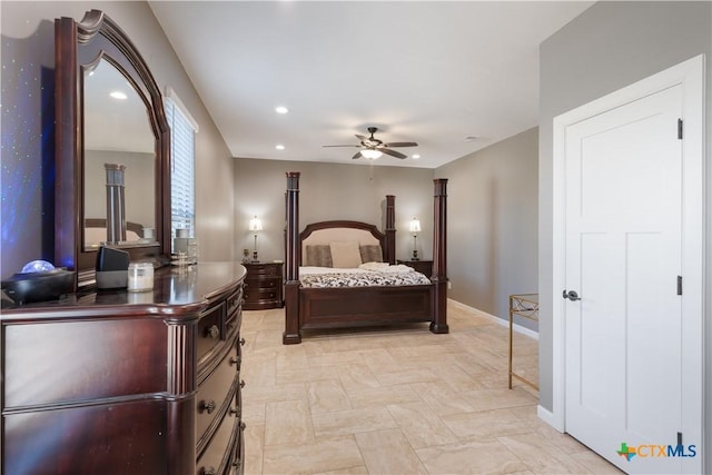 bedroom featuring baseboards and recessed lighting