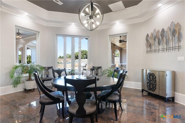 dining area featuring marble finish floor, baseboards, a raised ceiling, and crown molding