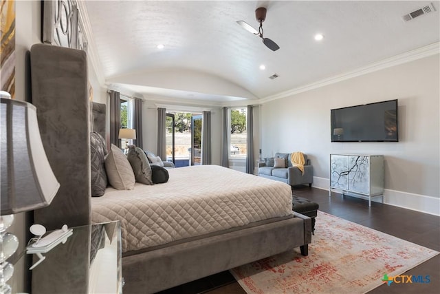 bedroom featuring vaulted ceiling, crown molding, wood finished floors, and baseboards