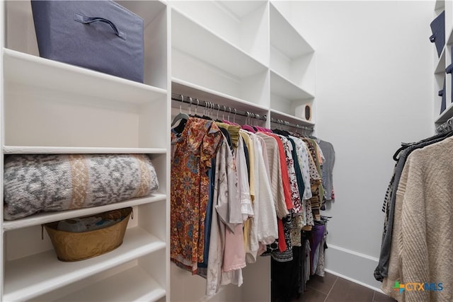 spacious closet featuring tile patterned flooring