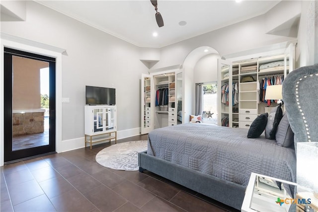 tiled bedroom featuring ceiling fan, recessed lighting, baseboards, access to outside, and ornamental molding