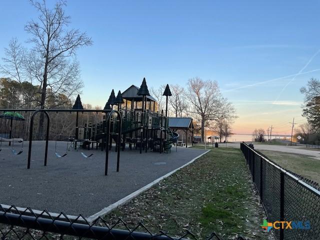 view of playground at dusk