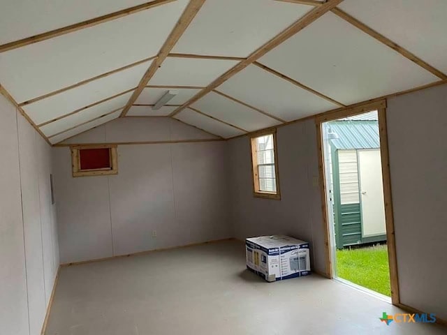 bonus room featuring vaulted ceiling