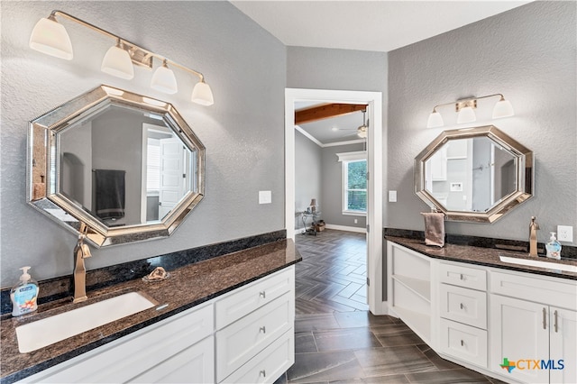 bathroom with ceiling fan, parquet floors, vanity, and ornamental molding